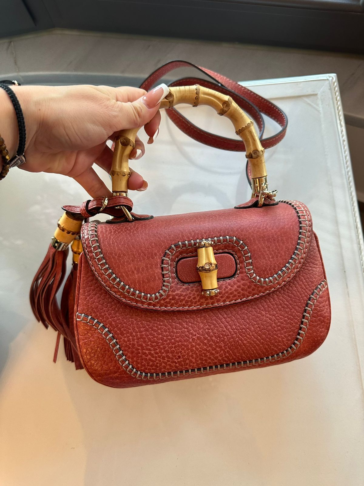 Gucci Dark Orange Grain Leather Tassel Bamboo Top Handle Bag